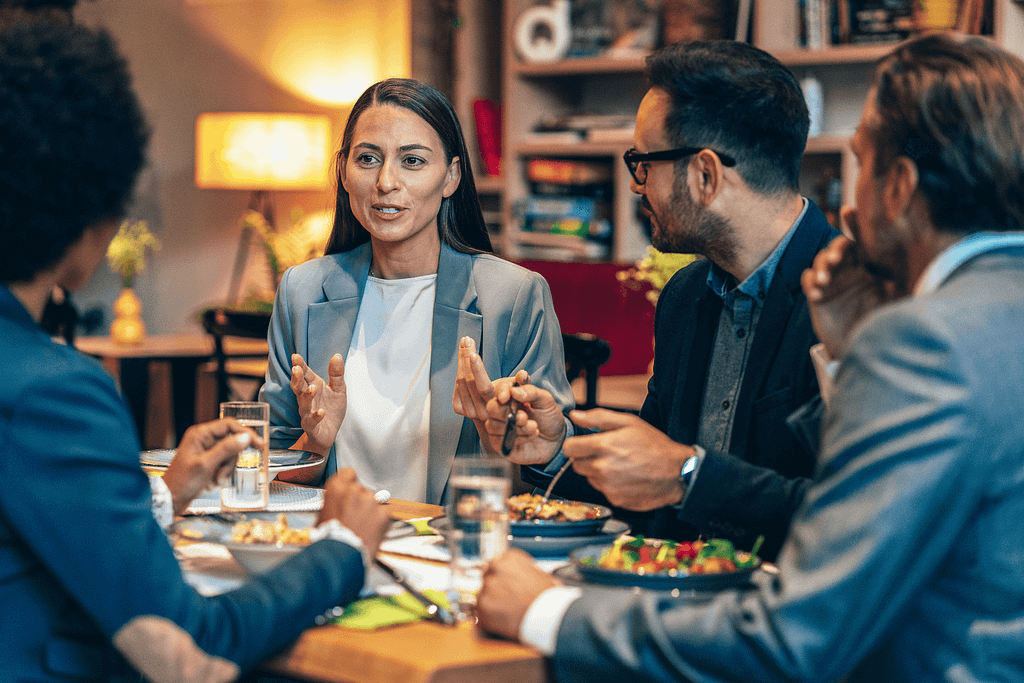 a group of coworkers eating in a mindful and tasteful breakroom