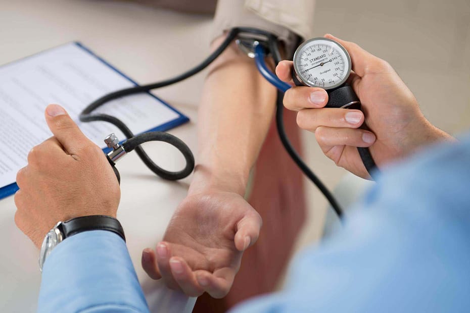 Person having their blood pressure checked for the health Contingent Wellness program.