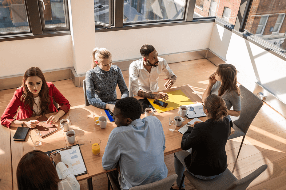 Corporate conference room meeting from overhead.
